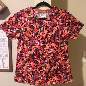 Like new warm colors circle printed scrub top